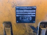 a sign on the back of a tractor that says hatz