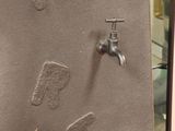 a sink with a faucet and a faucet on it