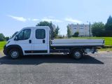 a white truck that is parked in the parking lot