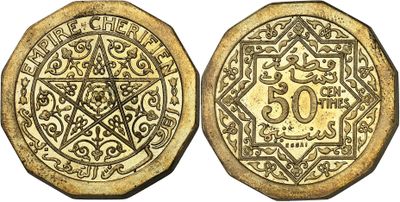 a gold coin with an ornate design on it