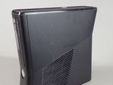 an image of a black electronic device sitting on a table