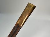 a close up of a baseball bat on a white surface
