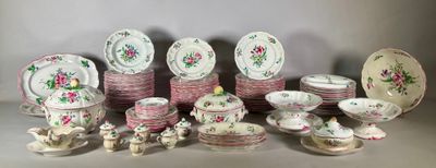 many plates and cups and saucers that are on the table