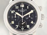 an image of a close up of a wrist watch with a black dial