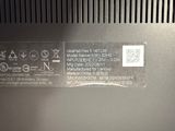a close up of a laptop with a sticker on it
