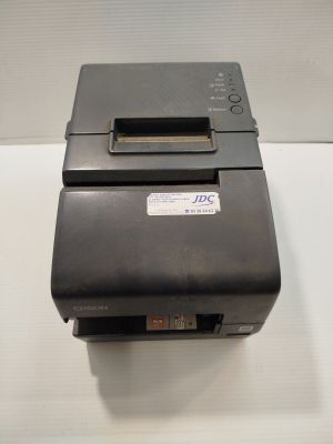 a printer that is sitting on top of a table
