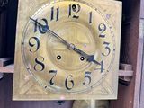 a clock that is hanging on the wall in the room