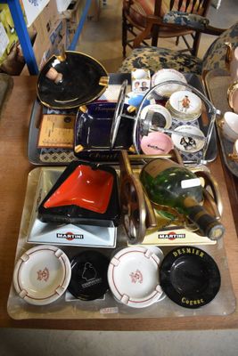 a table with a lot of dishes and cups on it