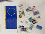 a lot of different stamps on the table together