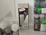 two boxes of balls and a box of balls on the table
