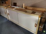 a cabinet that has some wood on top of it