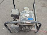 a small machine that is sitting on the ground