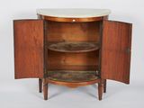 a small cabinet with a marble top and two shelves