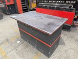 an image of a metal work bench in a factory