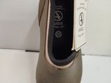 a close up of a shoe with a tag on it