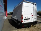 a white van parked on the side of the road