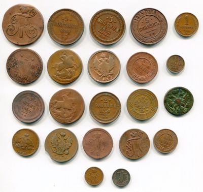 a lot of coins that are on the table