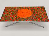 an image of a table with an orange and green design on it
