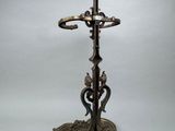 pair of antique brass candlesticks and a cross