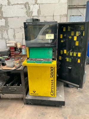 two machines that are sitting next to each other on the floor