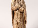 a statue of a woman holding a baby in her arms