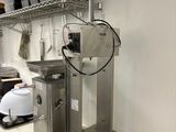 an image of a commercial kitchen with stainless steel counter tops