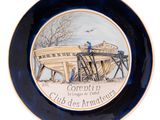 une assiette avec l'image d'un bateau