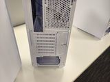 a white computer case sitting on top of a table