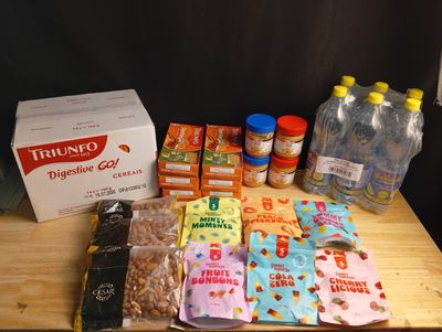 a wooden table topped with a variety of food items