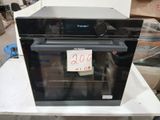 a black oven sitting on top of a white table