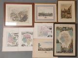 de nombreuses cartes encadrées représentant différents pays accrochées au mur