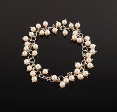 a pearl and silver bracelet