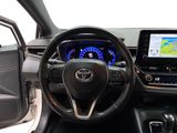 the interior of a car with a steering wheel, dashboard, and dashboard lights