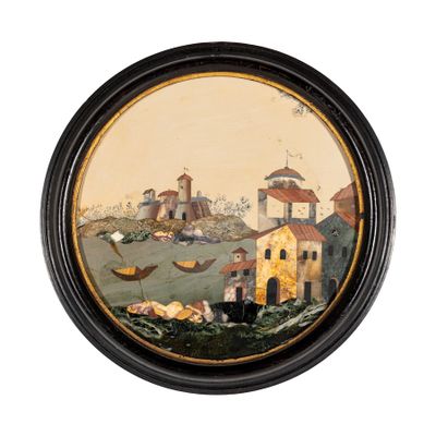 une photo d'un tableau représentant un village, dans un cadre noir