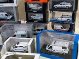 many different models of police vehicles in the box