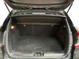 a trunk of a car with the back door open