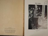 a book with a picture of a man in a suit and tie