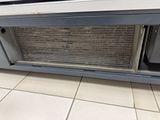 a radiator that is sitting on the floor in a room