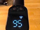 a digital clock displayed on the handlebar of a bicycle