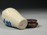 a small vase that is sitting on a table