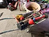 a cart full of tools sitting on the floor