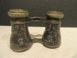 a pair of binoculars that are on a table