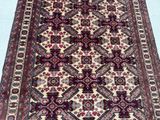 an oriental rug on a blue floor with a white background