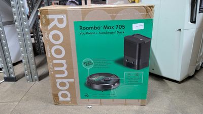 packaging for a roombaby max 205 vacuum cleaner in a store