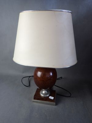 lamp in the shape of a sphere with a wooden base and a white shade