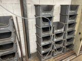 many bins that are stacked up in a room