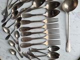 a lot of spoons and spoon spoons on a plate