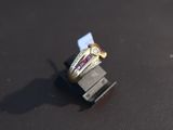 a ring that is sitting on top of a usb drive