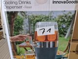 emballage d'un distributeur de boissons posé sur une boîte en carton