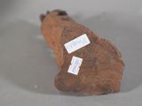 a small piece of rock with stickers on it